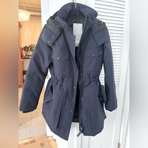 New Canada Goose, great looking stylish dark blue jacket ladies size S.